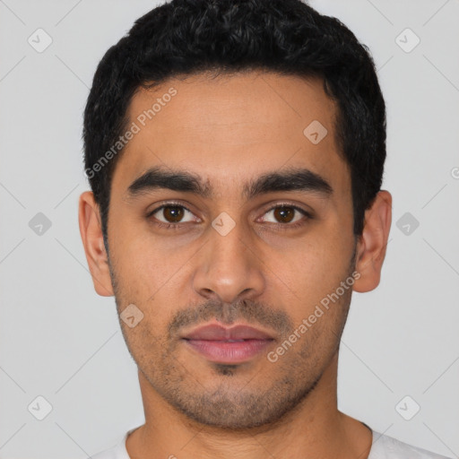 Neutral latino young-adult male with short  black hair and brown eyes