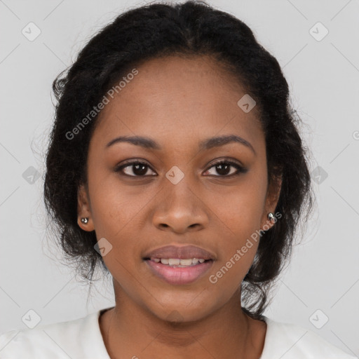 Joyful black young-adult female with long  brown hair and brown eyes