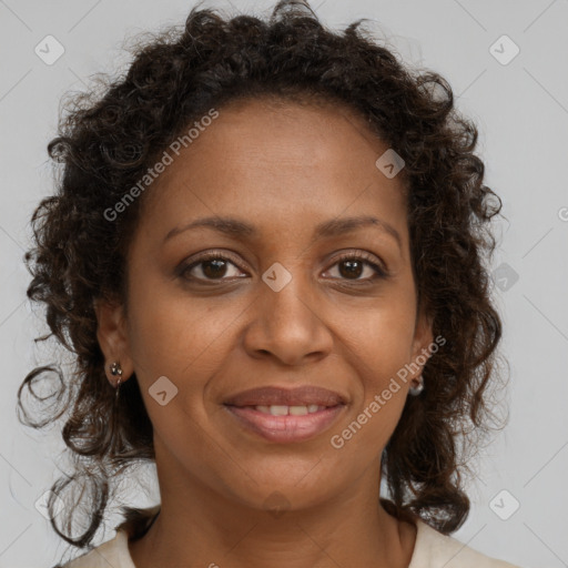 Joyful black young-adult female with medium  brown hair and brown eyes