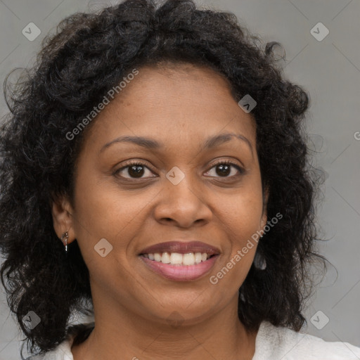 Joyful black young-adult female with medium  brown hair and brown eyes