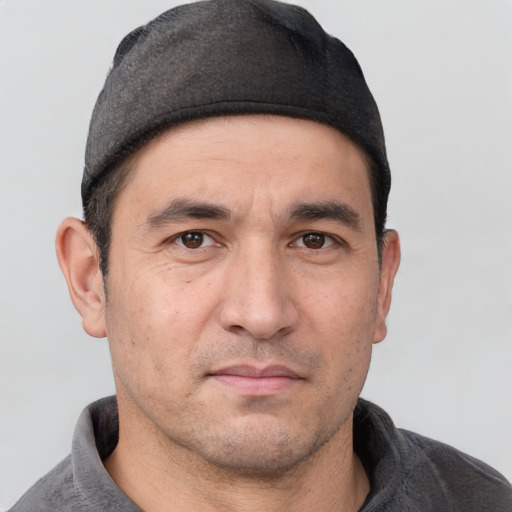 Neutral white adult male with short  brown hair and brown eyes