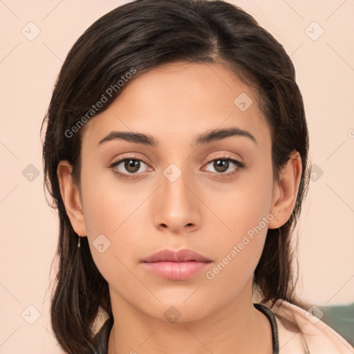 Neutral white young-adult female with long  brown hair and brown eyes