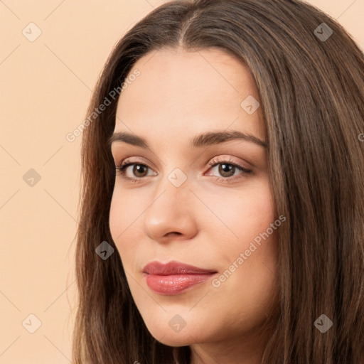 Neutral white young-adult female with long  brown hair and brown eyes