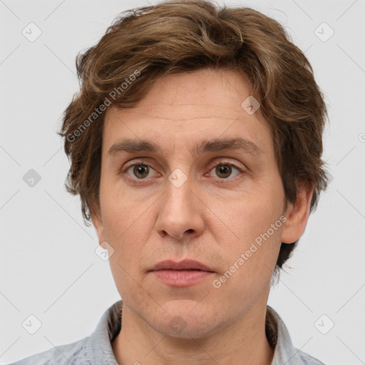 Joyful white adult male with short  brown hair and grey eyes