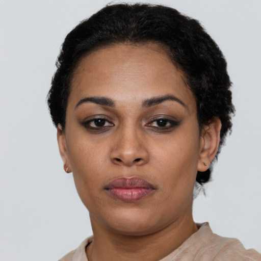 Neutral black young-adult female with short  black hair and brown eyes
