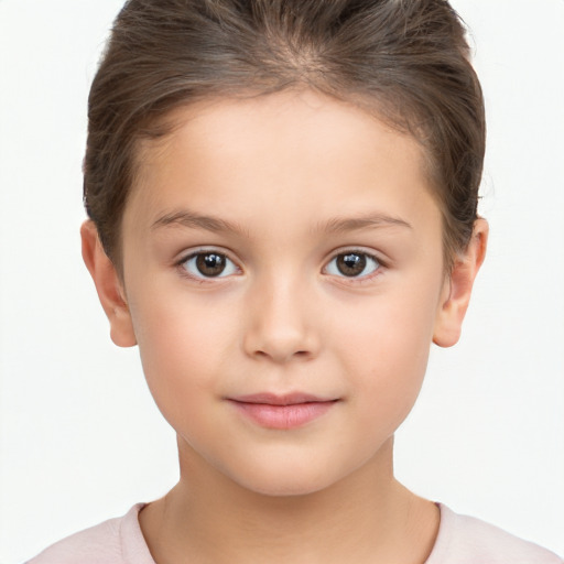 Joyful white child female with short  brown hair and brown eyes