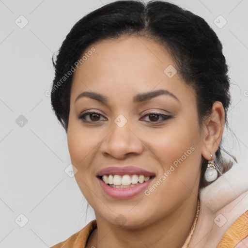 Joyful latino young-adult female with long  brown hair and brown eyes