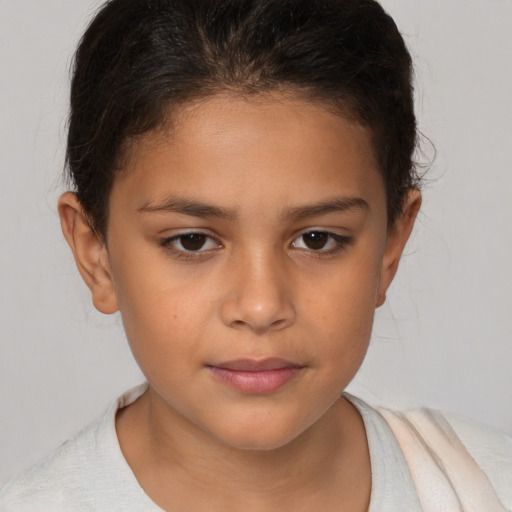 Joyful white child female with short  brown hair and brown eyes