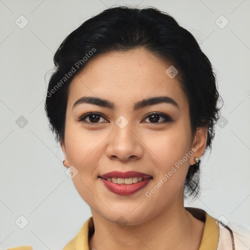 Joyful asian young-adult female with medium  black hair and brown eyes