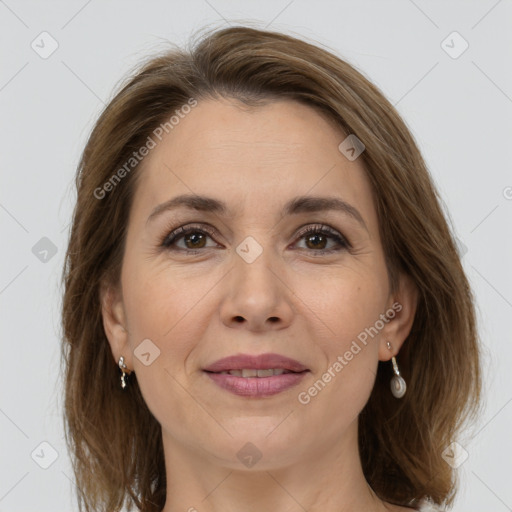 Joyful white adult female with medium  brown hair and grey eyes