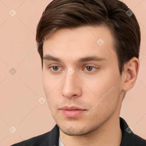 Neutral white young-adult male with short  brown hair and brown eyes