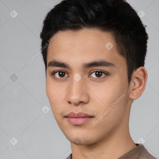 Neutral white young-adult male with short  black hair and brown eyes