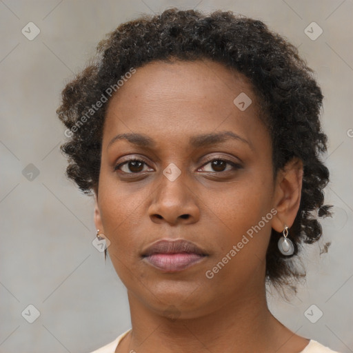 Neutral black young-adult female with short  brown hair and brown eyes