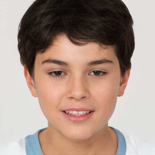 Joyful white child male with short  brown hair and brown eyes