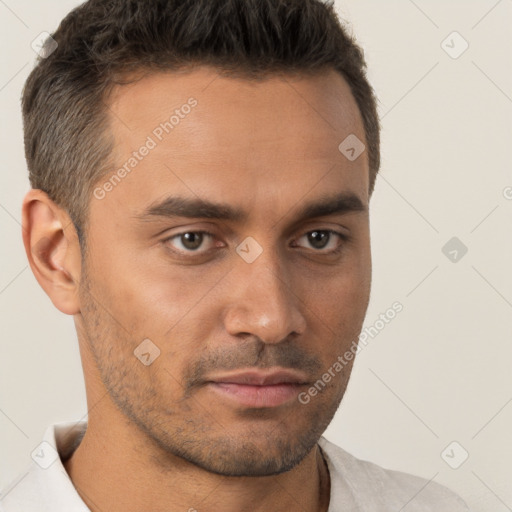 Neutral white young-adult male with short  brown hair and brown eyes