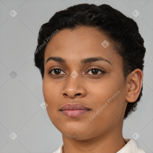 Joyful black young-adult female with short  brown hair and brown eyes