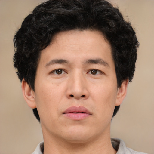 Neutral asian young-adult male with short  brown hair and brown eyes