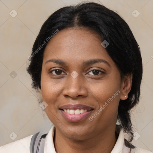 Joyful latino young-adult female with medium  brown hair and brown eyes