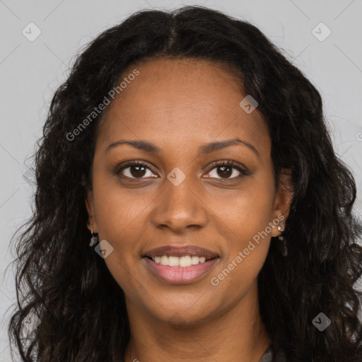 Joyful black young-adult female with long  brown hair and brown eyes