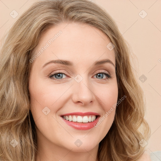 Joyful white young-adult female with long  brown hair and green eyes