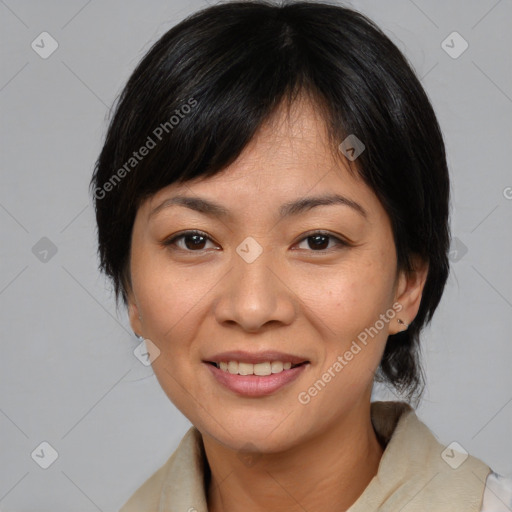 Joyful asian young-adult female with medium  brown hair and brown eyes