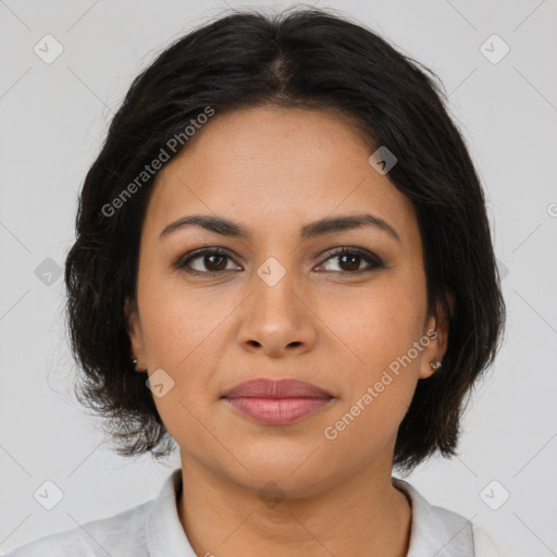 Joyful latino young-adult female with medium  brown hair and brown eyes