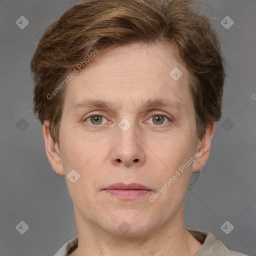 Joyful white adult male with short  brown hair and grey eyes