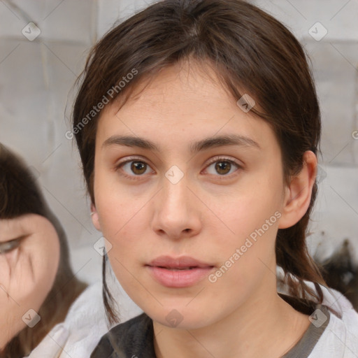 Neutral white young-adult female with medium  brown hair and brown eyes