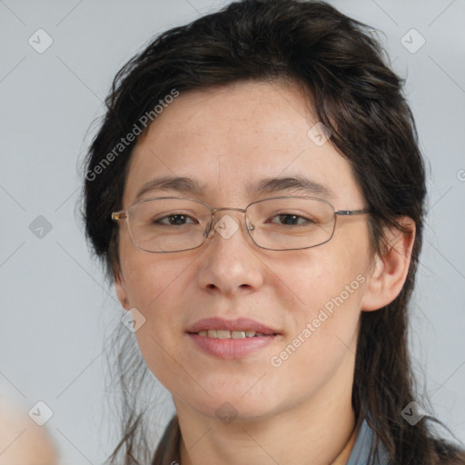 Joyful white adult female with medium  brown hair and brown eyes