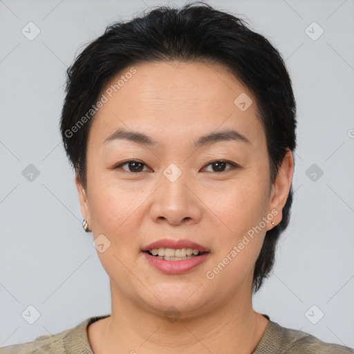 Joyful asian young-adult female with short  brown hair and brown eyes