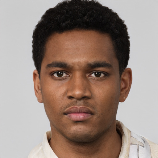 Neutral black young-adult male with short  black hair and brown eyes