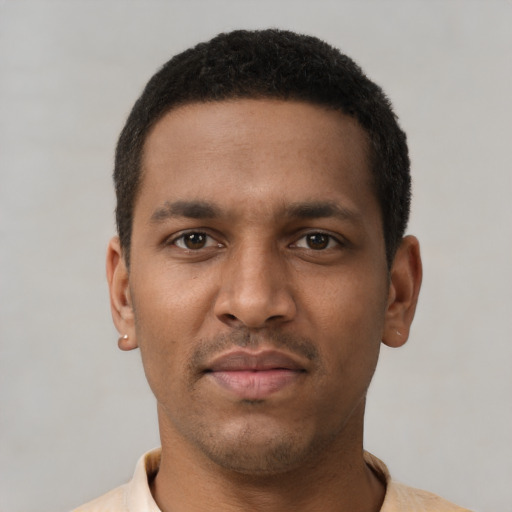 Neutral black young-adult male with short  brown hair and brown eyes