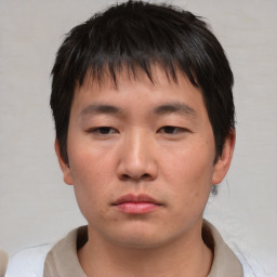 Neutral asian young-adult male with short  brown hair and brown eyes