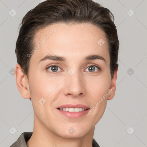 Joyful white young-adult female with short  brown hair and grey eyes