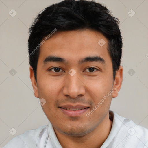 Joyful latino young-adult male with short  black hair and brown eyes