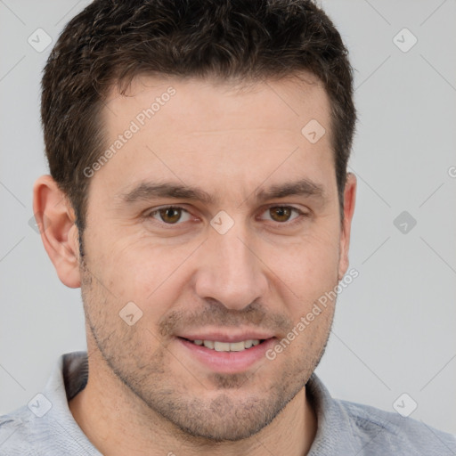 Joyful white adult male with short  brown hair and brown eyes