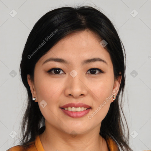 Joyful asian young-adult female with medium  brown hair and brown eyes