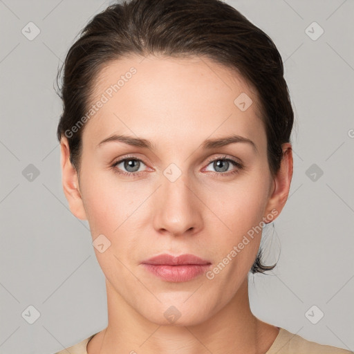 Neutral white young-adult female with short  brown hair and grey eyes