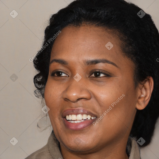 Joyful latino young-adult female with short  black hair and brown eyes