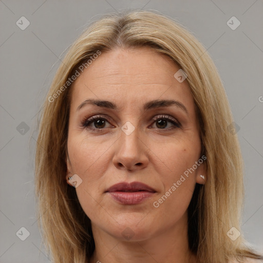 Joyful white adult female with medium  brown hair and brown eyes