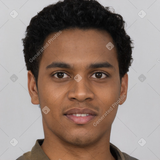 Joyful black young-adult male with short  brown hair and brown eyes