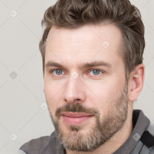 Neutral white young-adult male with short  brown hair and grey eyes