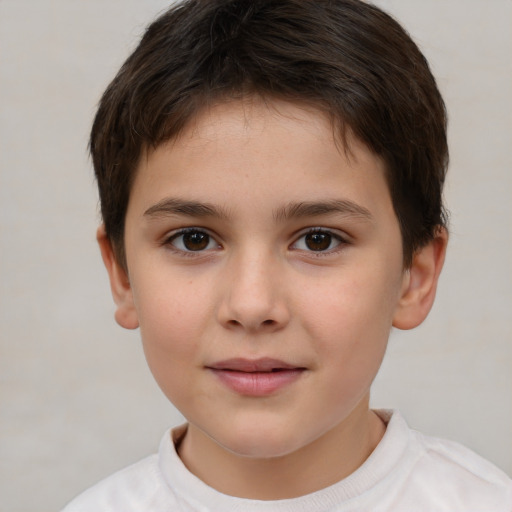 Joyful white child female with short  brown hair and brown eyes