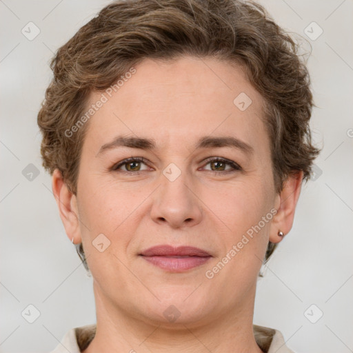 Joyful white adult female with short  brown hair and grey eyes