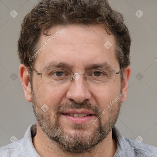 Joyful white adult male with short  brown hair and grey eyes