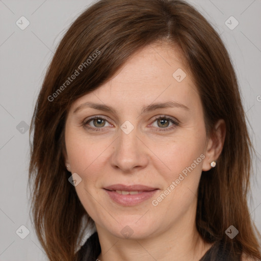 Joyful white adult female with long  brown hair and brown eyes