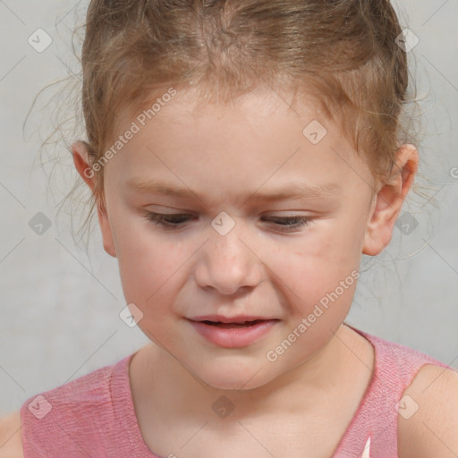 Joyful white child male with short  brown hair and brown eyes