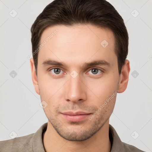 Neutral white young-adult male with short  brown hair and brown eyes