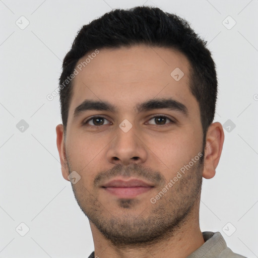 Neutral latino young-adult male with short  black hair and brown eyes