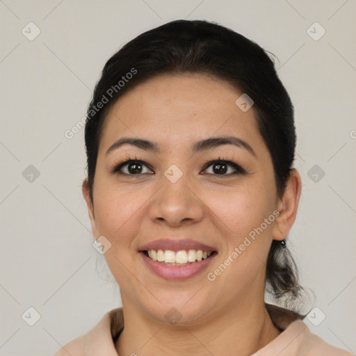 Joyful asian young-adult female with medium  brown hair and brown eyes